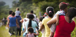 Caravana migrante abandona Puebla capital CURP