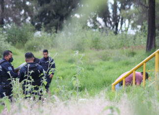 Hallan el cuerpo de una joven junto a la autopista México-Puebla