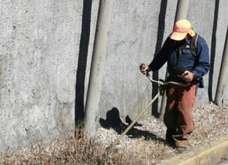Realizan limpia y mantenimiento a Distribuidor Juárez-Serdán