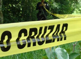 Hallan cuerpo de mujer en lote baldío de Acajete cuerpo