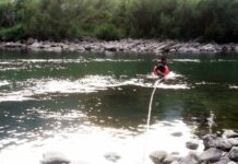 Muere pescador al ser arrastrado por río en Tlatlauquitepec