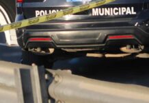 Dejan cuerpo embolsado junto a carretera en Tecali de Herrera Cuerpo