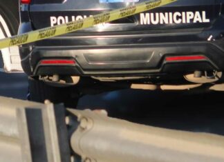 Dejan cuerpo embolsado junto a carretera en Tecali de Herrera Cuerpo