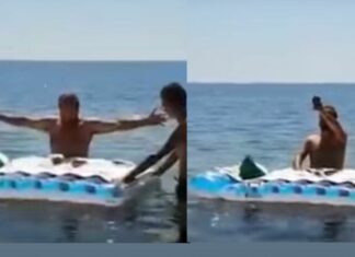 Cura celebra misa dentro del mar ante las altas temperaturas