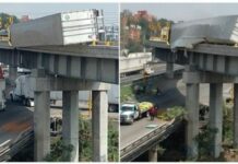 Tráiler vuelca y queda a punto de caer en puente de Circuito Exterior Mexiquense