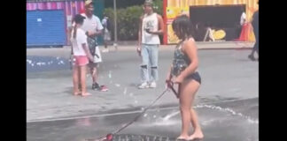 ¡Insólito! Joven pasea a caimán en Love Park, Estados Unidos joven