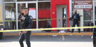 Policía localiza auto de asaltantes de camioneta de valores policía