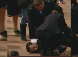 Arrestan a hombre por lanzarse al féretro de la reina Isabel II