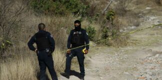 Ubican cuerpo de mujer enterrado en campos de Amozoc cuerpo