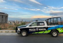 Hallan cadáver encobijado en terreno baldío de Puebla capital