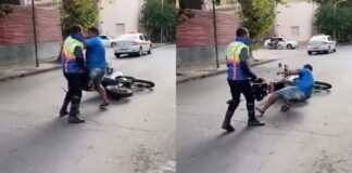 Policía noquea a taxista que lo tiró de su moto Policía