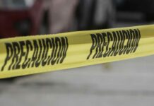 Hallan cadáver encajuelado en la México-Puebla cadáver