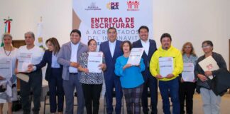 Sergio Salomón preside entrega de 236 escrituras de INFONAVIT escrituras