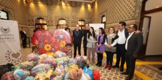 Voluntariado del Congreso recibe donación de tapitas y prendas de abrigo