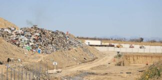 Acuerdan estudio de impacto ambiental del basurero de Cholula y reabren carretera Cholula