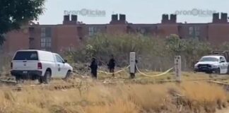 Hallan cadáver embolsado en Santa María Coronango