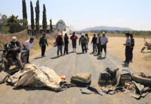 Bloquean carretera Cholula-Calpan para exigir cierre de Planta de Residuos Urbanos planta