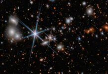 Telescopio Webb capta la fusión de agujeros negros más lejana Agujeros negros