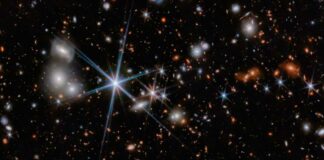 Telescopio Webb capta la fusión de agujeros negros más lejana Agujeros negros