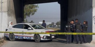 Hallan cuerpo embolsado abajo del puente de Xonacatepec