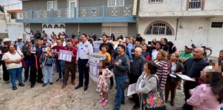 Entregan artículos de Morena tras evento de candidato a ministro en Puebla