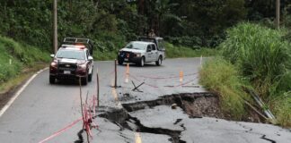 Siguen incomunicadas 77 localidades en Puebla tras lluvias: SICT