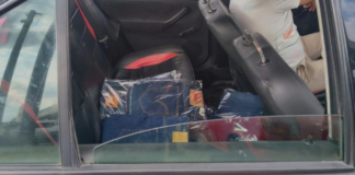 Detienen a tres presuntos estafadores por venta de ropa falsa en la Puebla-Orizaba