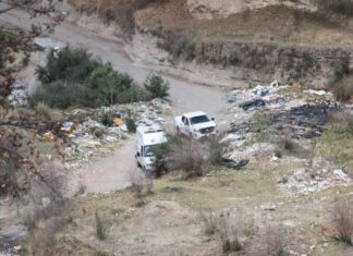 Maniatados y con disparos, abandonan dos cuerpos en barranca de Puebla