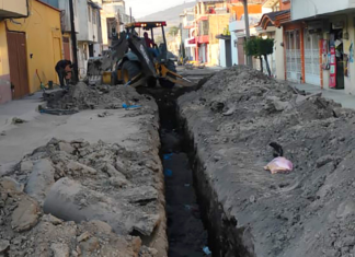 Rehabilitan drenaje en calle Mariano Escobedo de Texmelucan