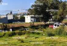 Hallan cadáver dentro de vehículo calcinado en Amozoc