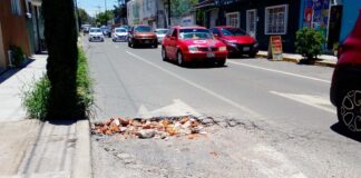 Conductores piden rehabilitación vial en avenida 18 Oriente