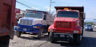 Camioneros de CMIT protestan por supuesta exclusión del Mega Bachetón