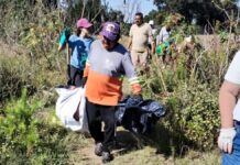 San Pedro Cholula limpia predio para evitar basurero clandestino