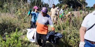 San Pedro Cholula limpia predio para evitar basurero clandestino