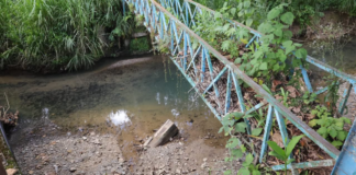 Supervisan arroyo de San Agustín Atlihuácan por riesgo de inundación