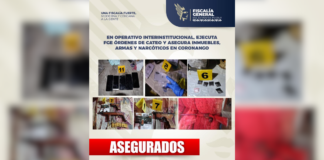 Catean dos inmuebles en Coronango; aseguran armas y droga