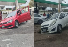 Dos autos caen en hoyo de drenaje sin tapa en Cuautlancingo