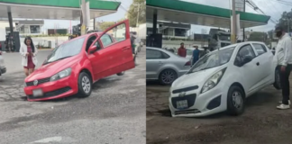 Dos autos caen en hoyo de drenaje sin tapa en Cuautlancingo