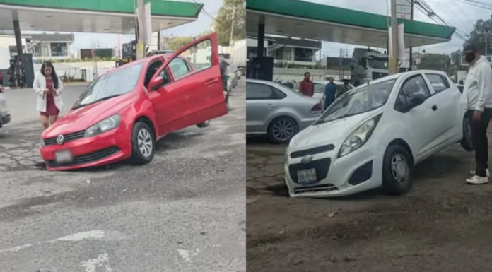 Dos autos caen en hoyo de drenaje sin tapa en Cuautlancingo